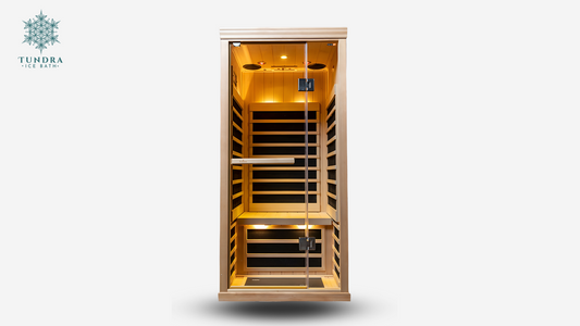 Discover the Equinox 1-Person Infrared Sauna by TUNDRA, a compact yet luxurious wellness solution. Occupying only 9 sq. ft., it's perfect for small spaces. Features Low EMR/EF, EvenHeat technology, and Canadian Hemlock construction. Enjoy an all-glass front, mood lighting, color therapy options, and Bluetooth speakers. Quick, tool-free assembly for a balanced, warm complement to cold therapy. Experience rejuvenation with Equinox.